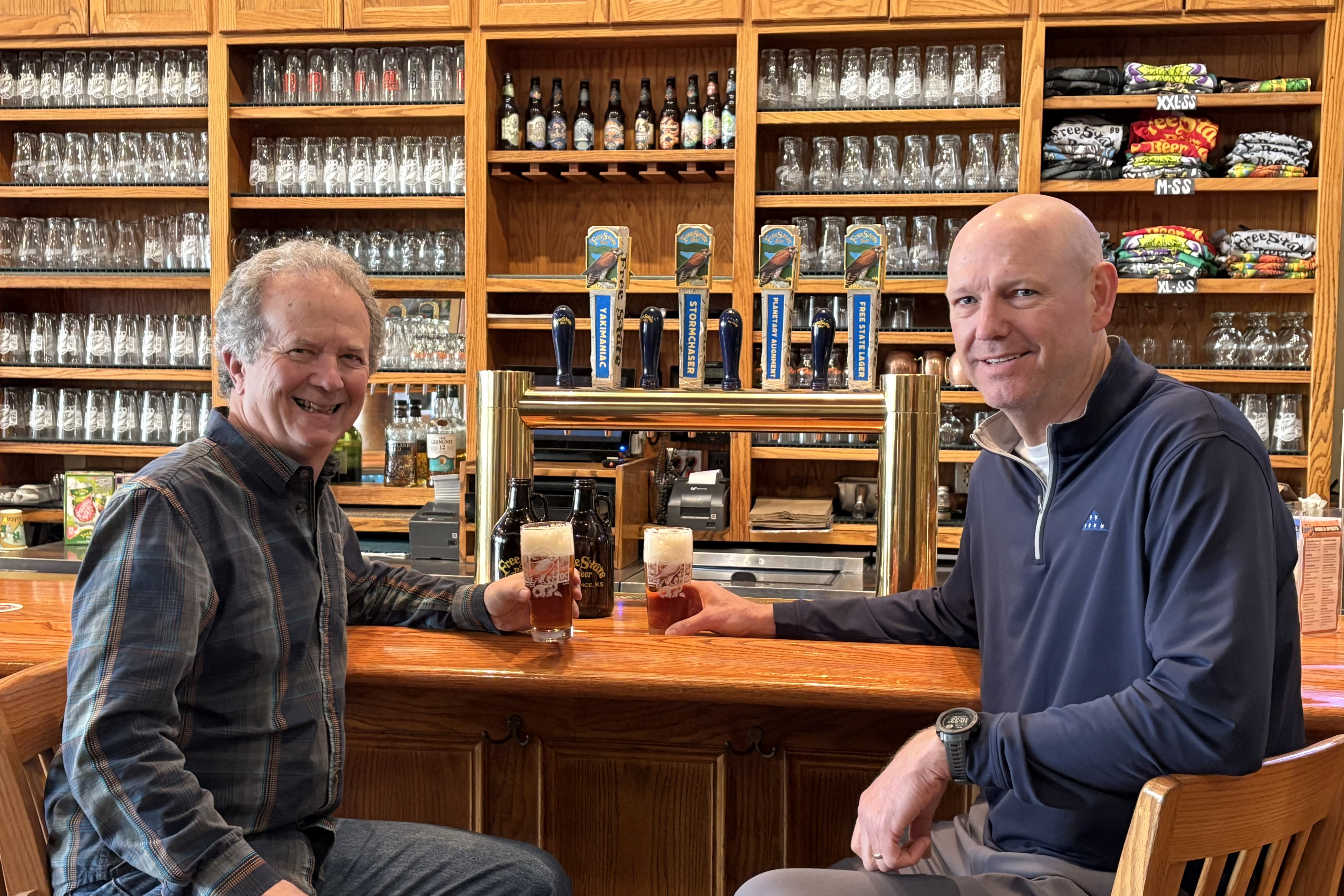 From left to right: Chuck Magerl, President, Free State Brewing Co.; Chris Piper, President, Grandstand